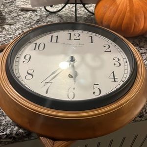 Wall clock with oak surround